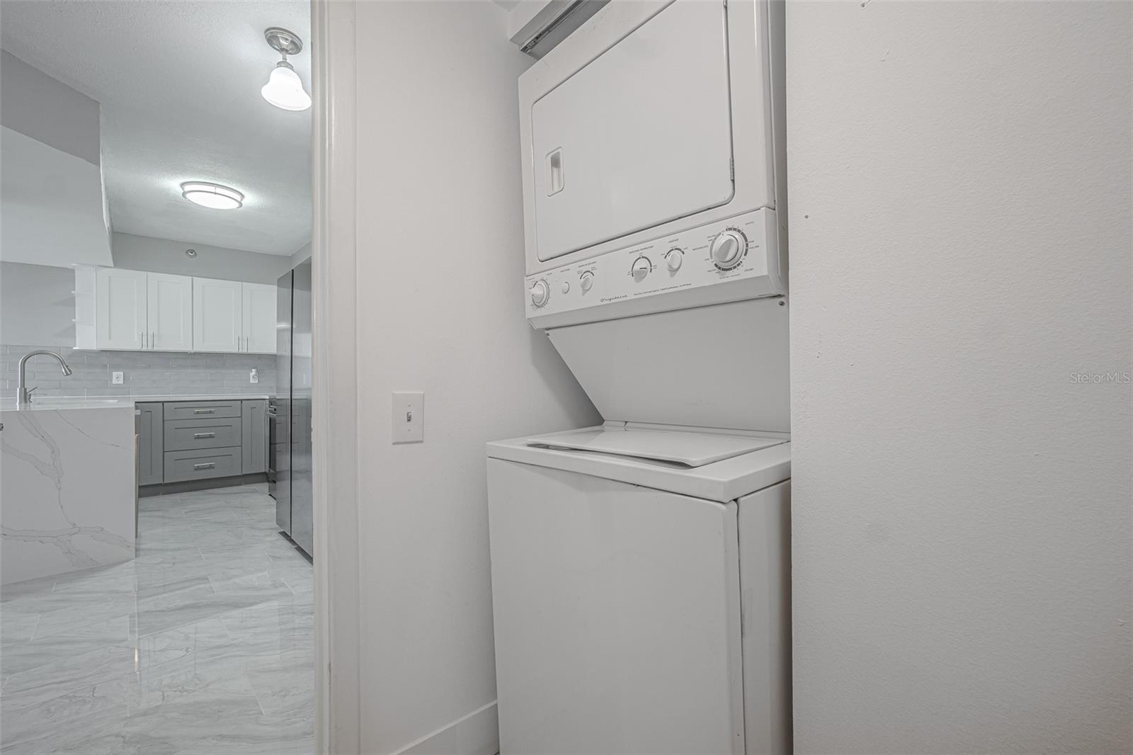 THERE IS A UTILITY ROOM WITH PLENTY OF STORAGE