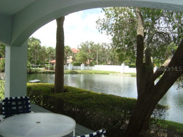 THE POOL AREA IS SURROUNDED BY A WRAP AROUND POND...VERY TRANQUIL