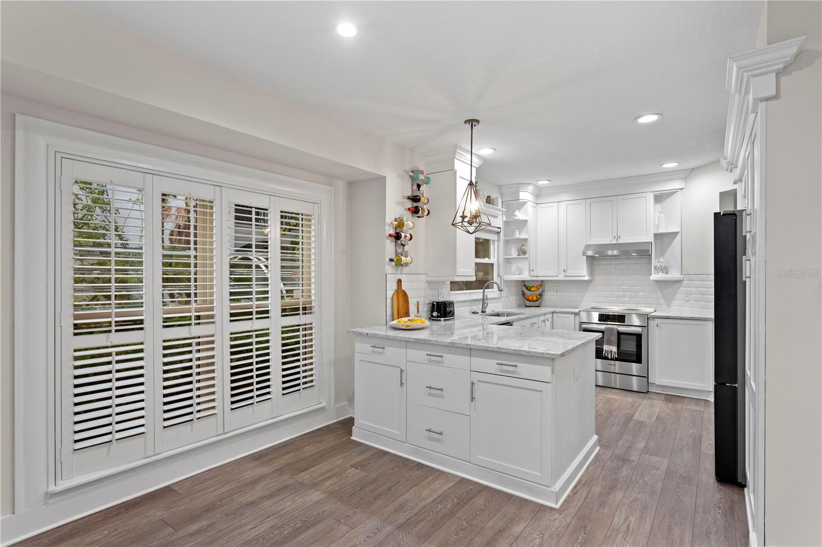 The space easily accommodates informal dining for day-to-day living."