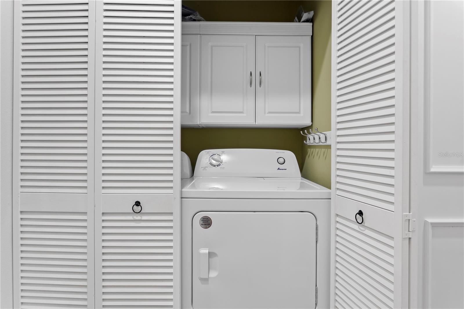A laundry closet is conveniently located on the first floor.