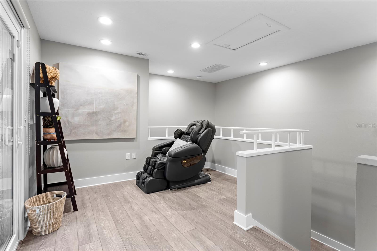 Adjacent to the primary suite is a versatile loft area—perfect as a home office, den, or reading nook—with access to a private balcony where you can relax and enjoy the cool breezes.