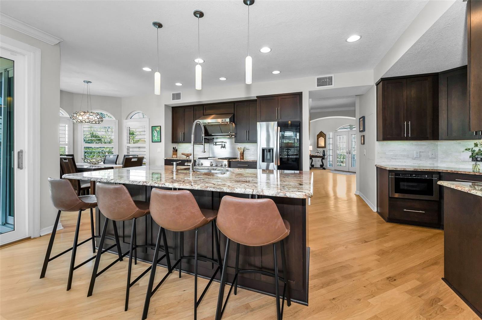 Kitchen with island and stainless steel appliances