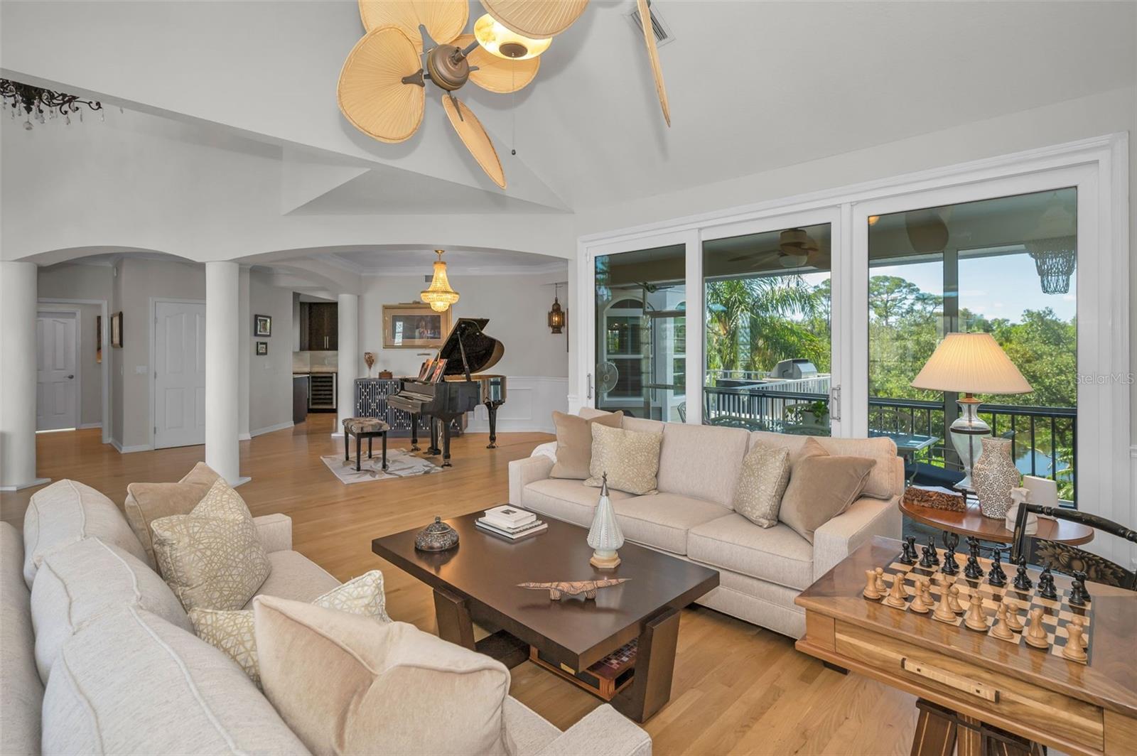 Welcoming living room with double tropical fan