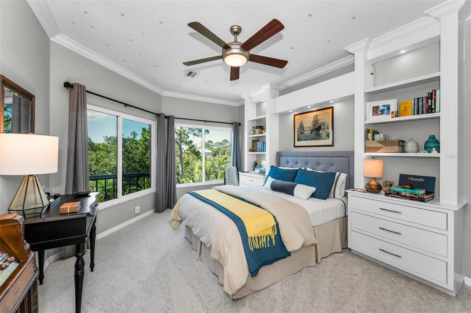 Bedroom with built-in bookcases
