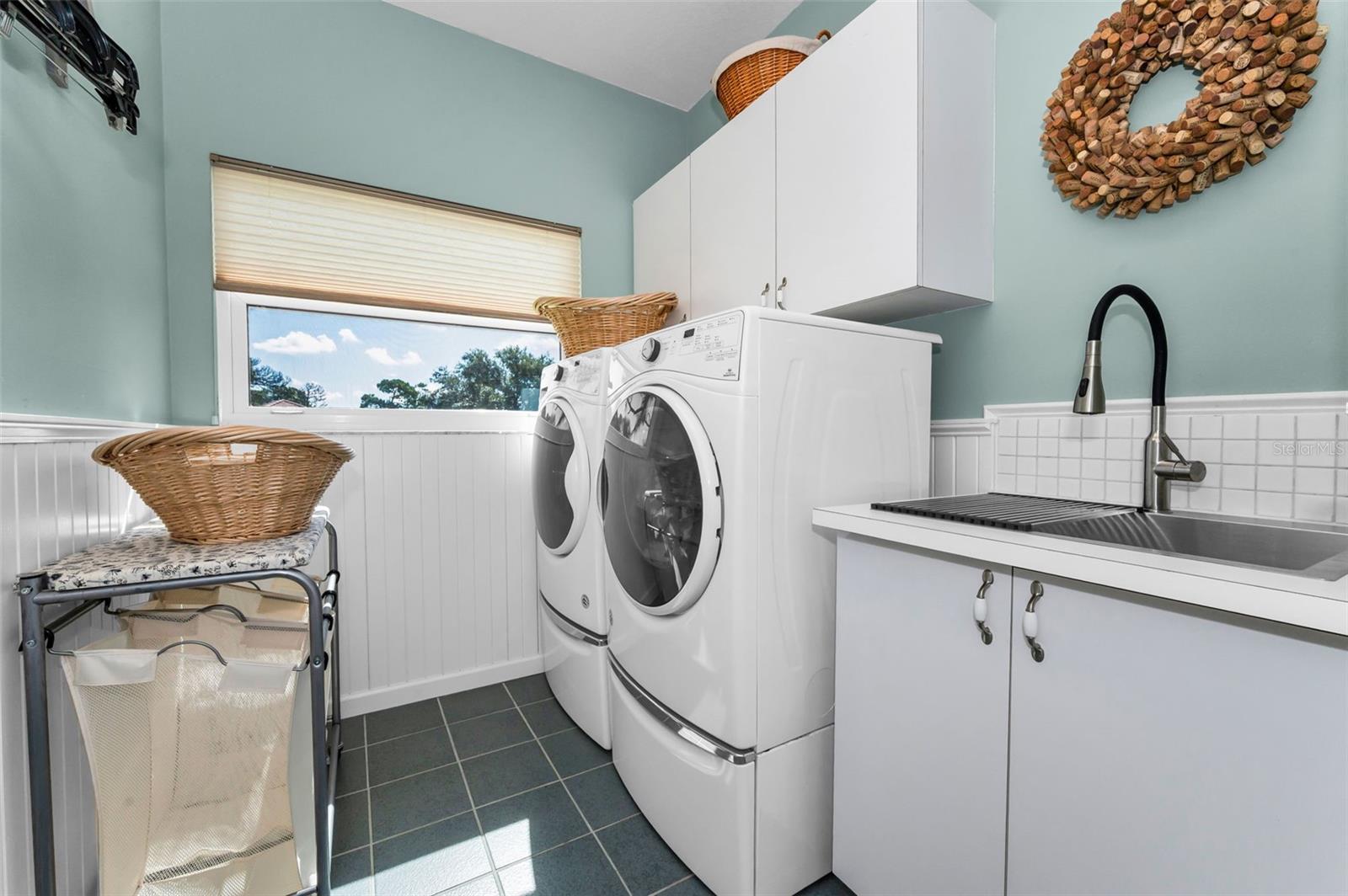 Large laundry room with sink