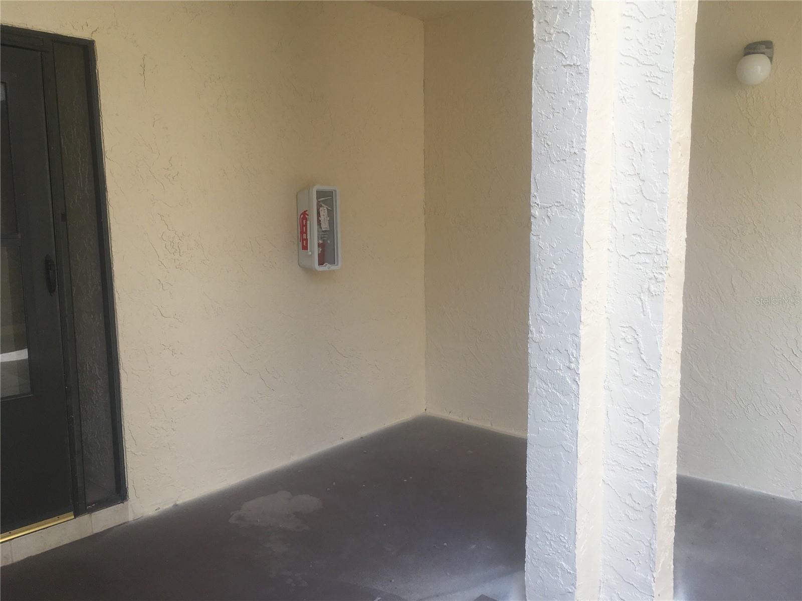 Unit exterior foyer to the left