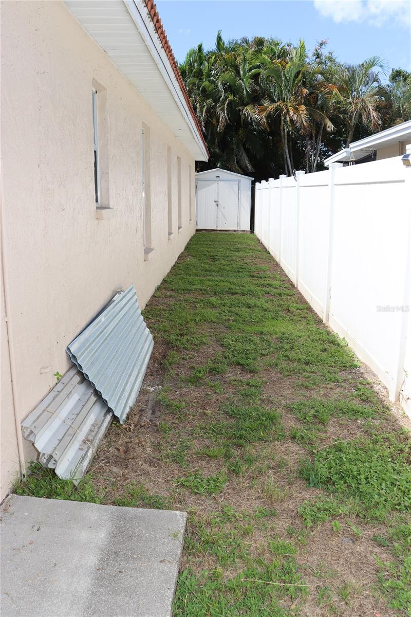 East side of house/dog run