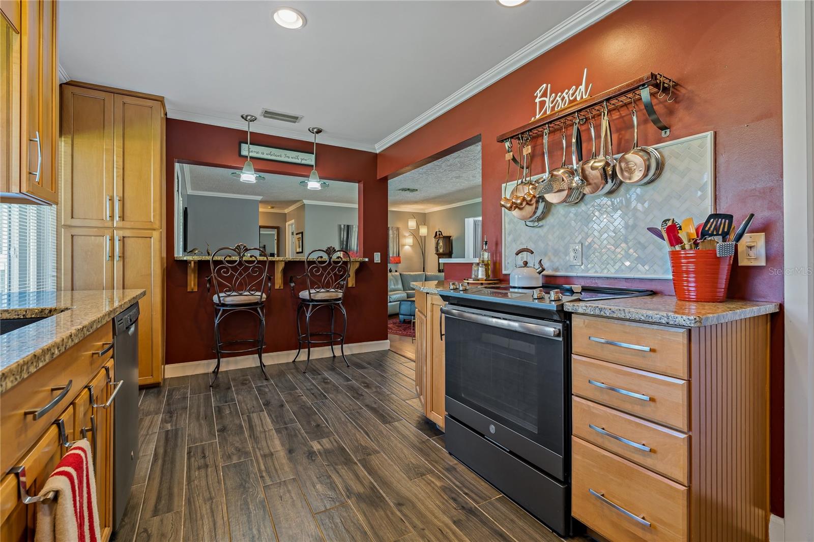 BEAUTIFUL PORCELAIN WOOD PLANK TILE IN KITCHEN!
