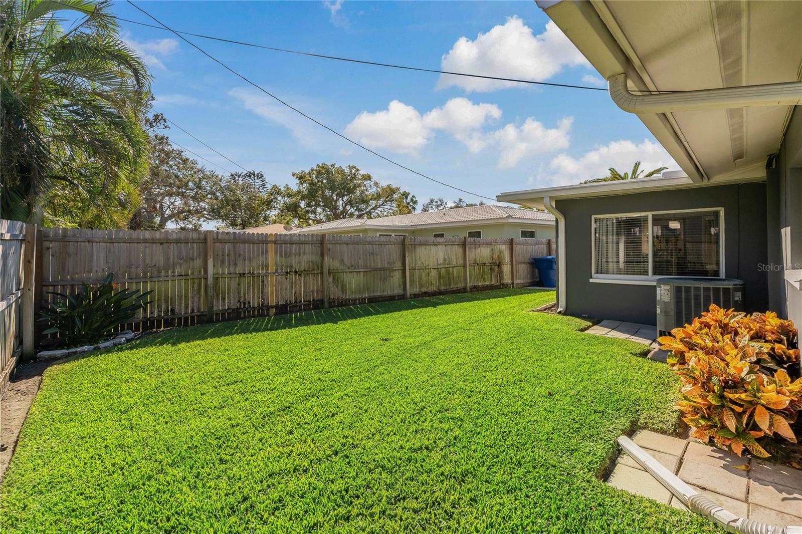 SPACIOUS AND FULLY FENCED IN BACKYARD