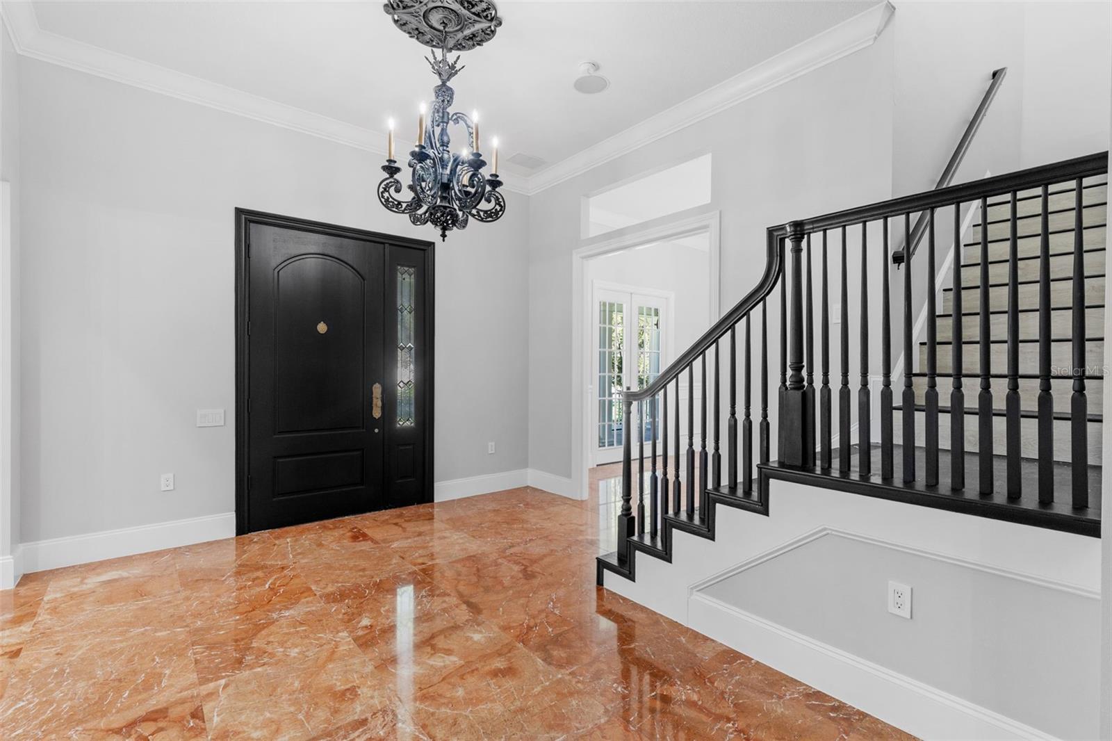 Stairwell, Front door and Family room entrance