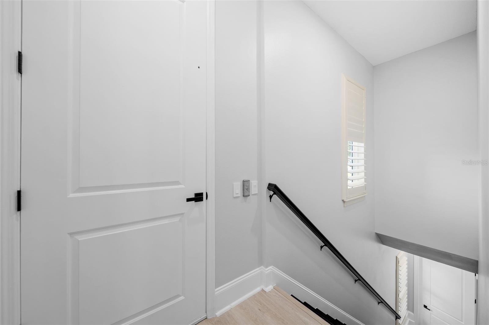 Elevator and stairwell to Garage apartment