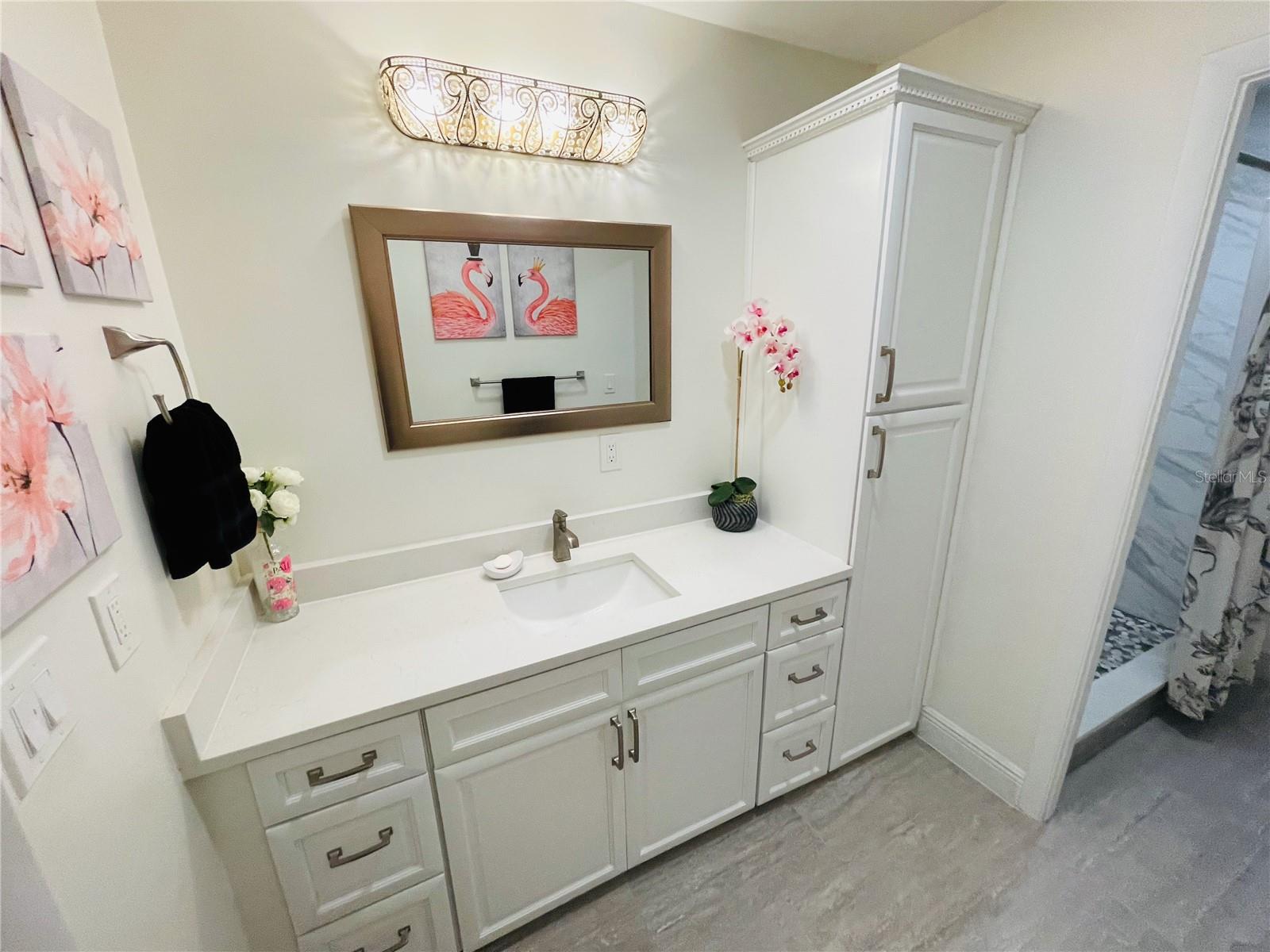Quartz countertops and wood cabinetry