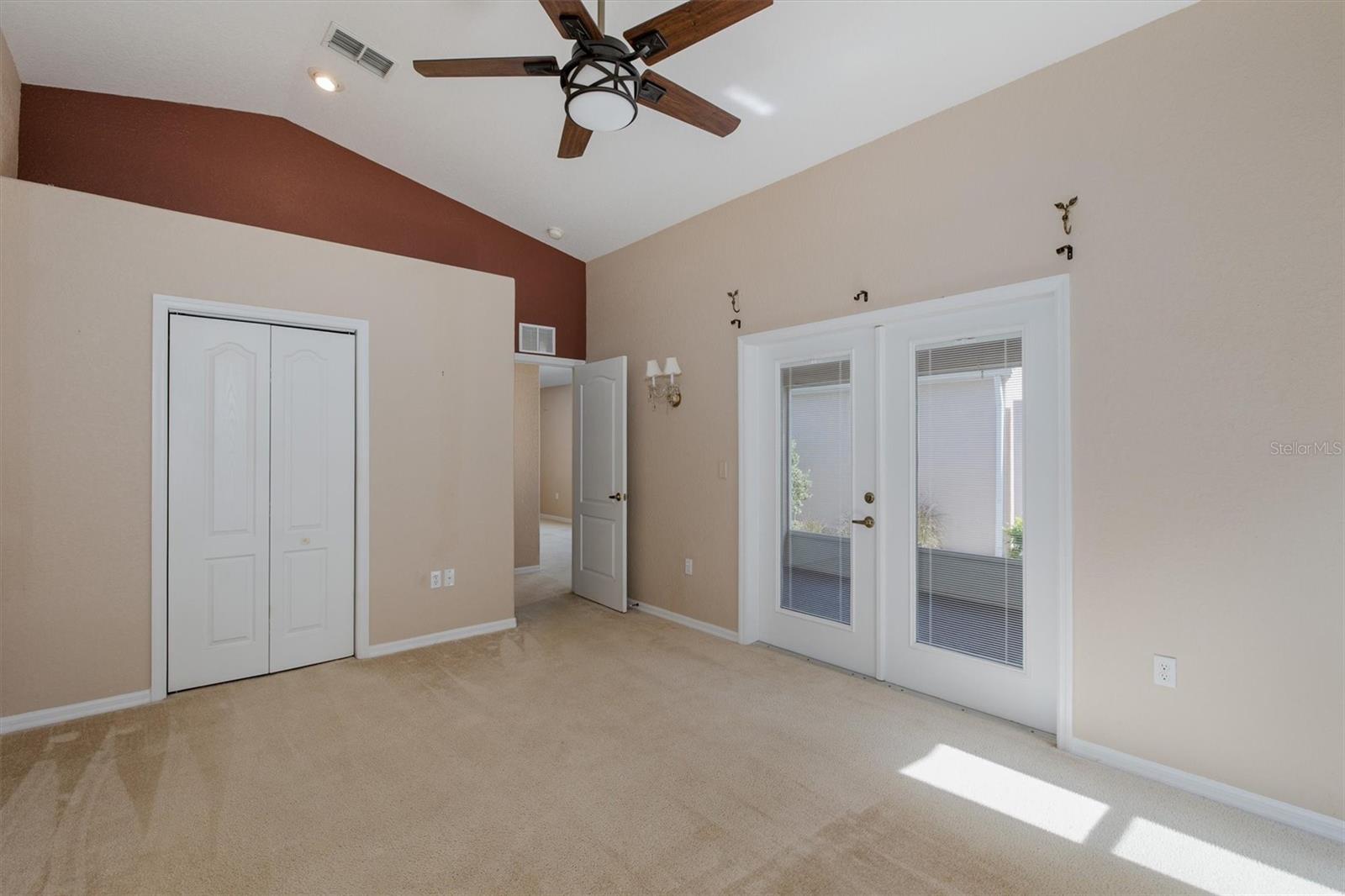 Primary with vaulted ceilings