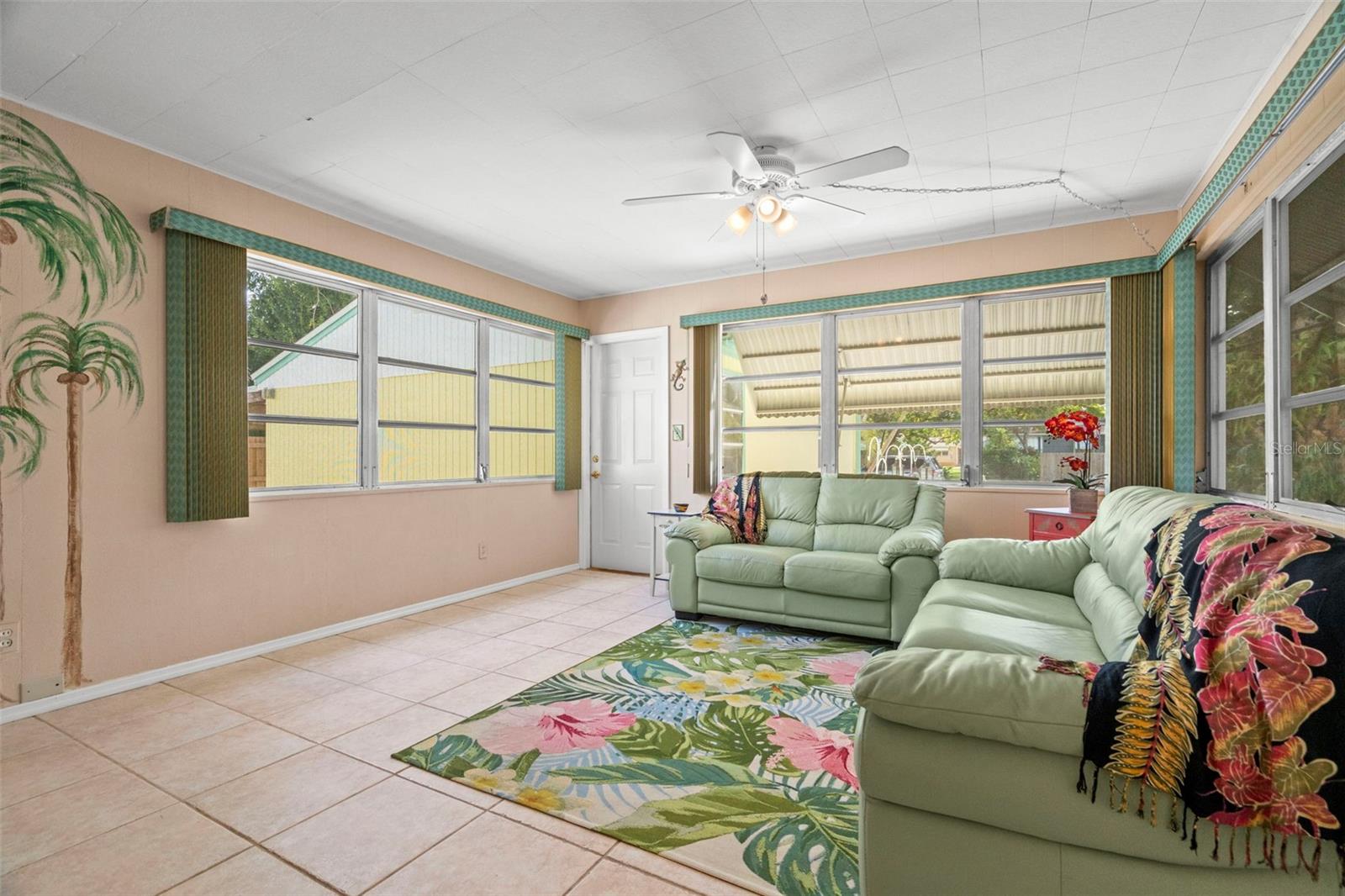 A light-filled bonus room provides generous space.