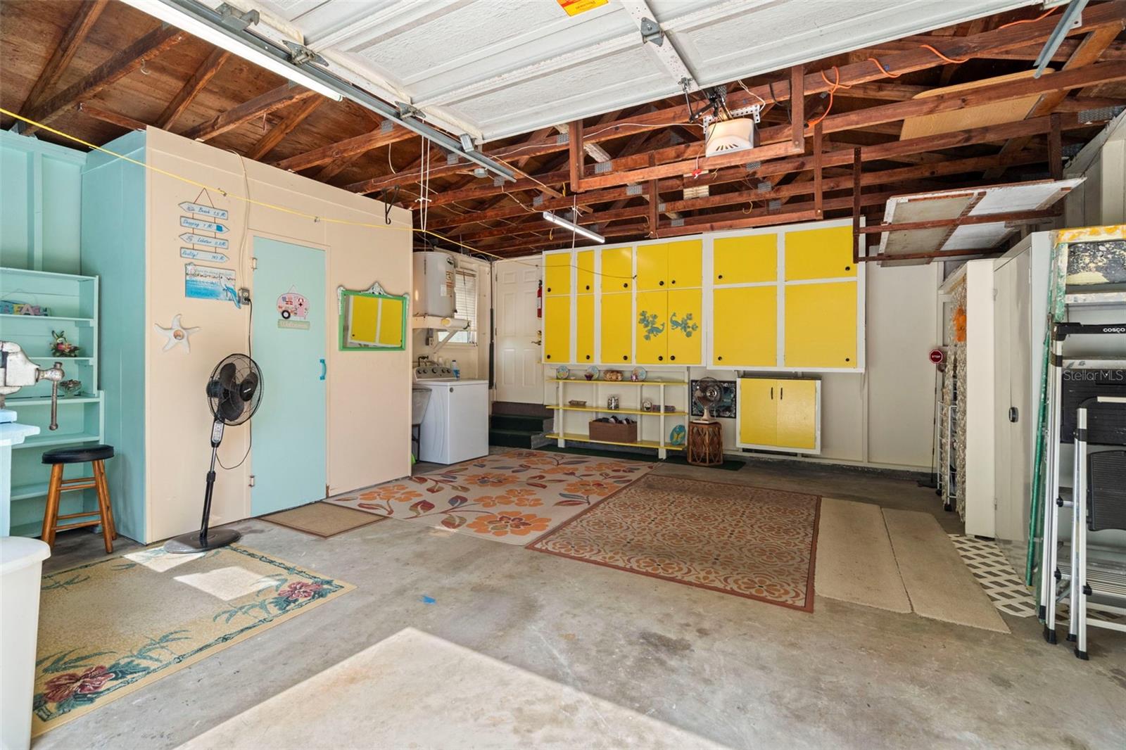 Oversized garage with half bath.