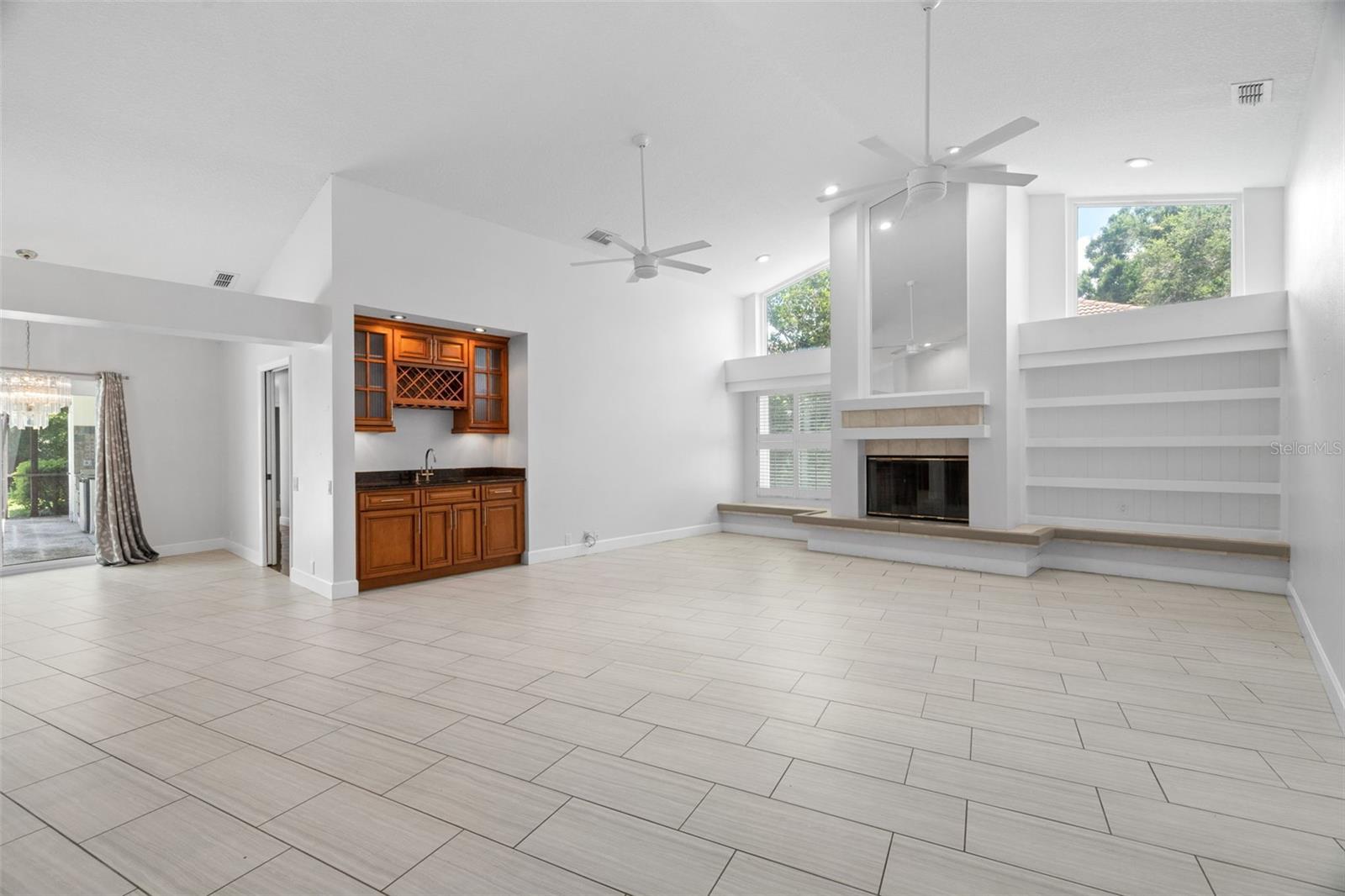 Family Room with Wood Burning Fireplace and Built-In's!