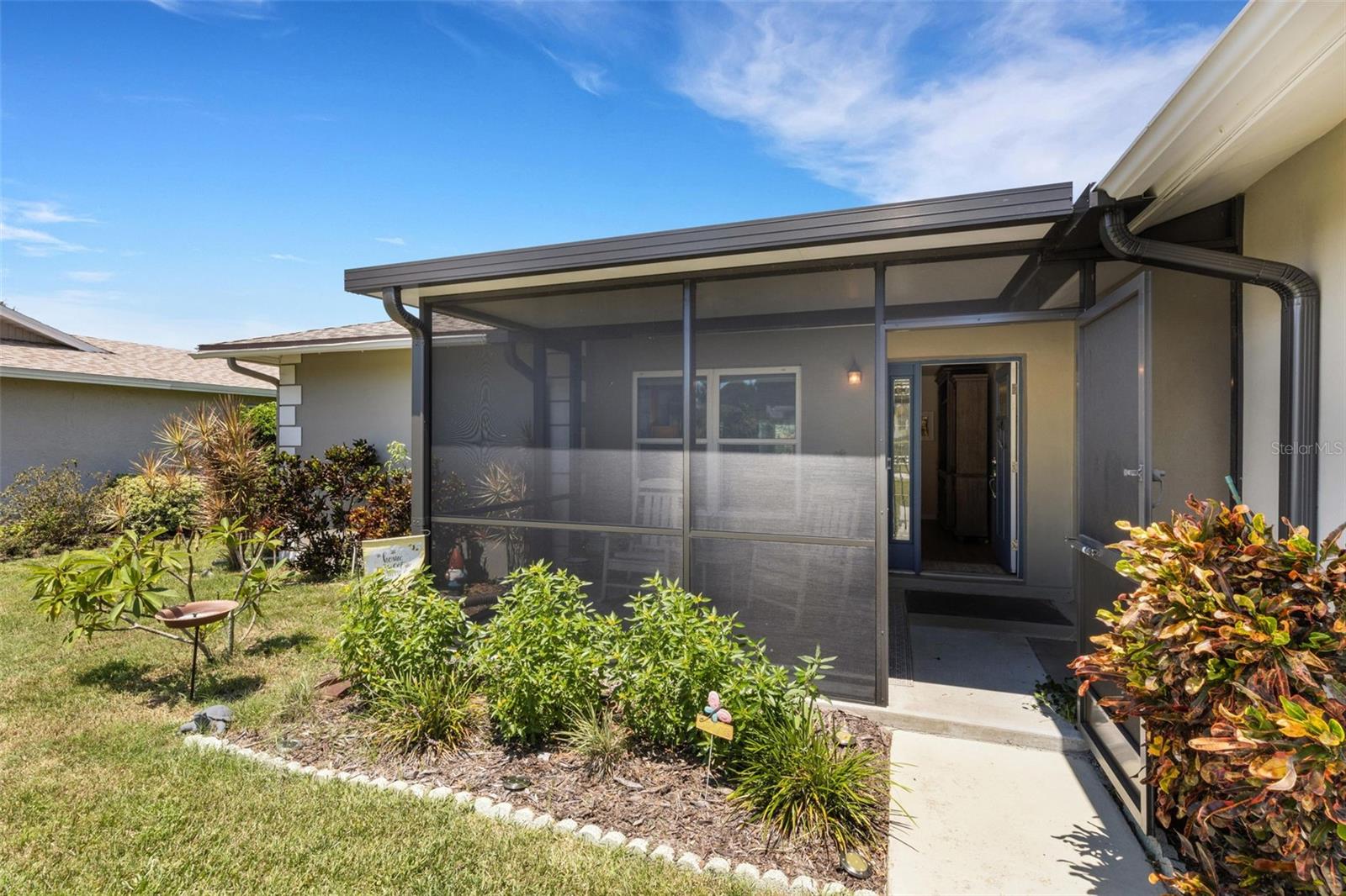 Outdoor Living Space with an Enclosed Porch