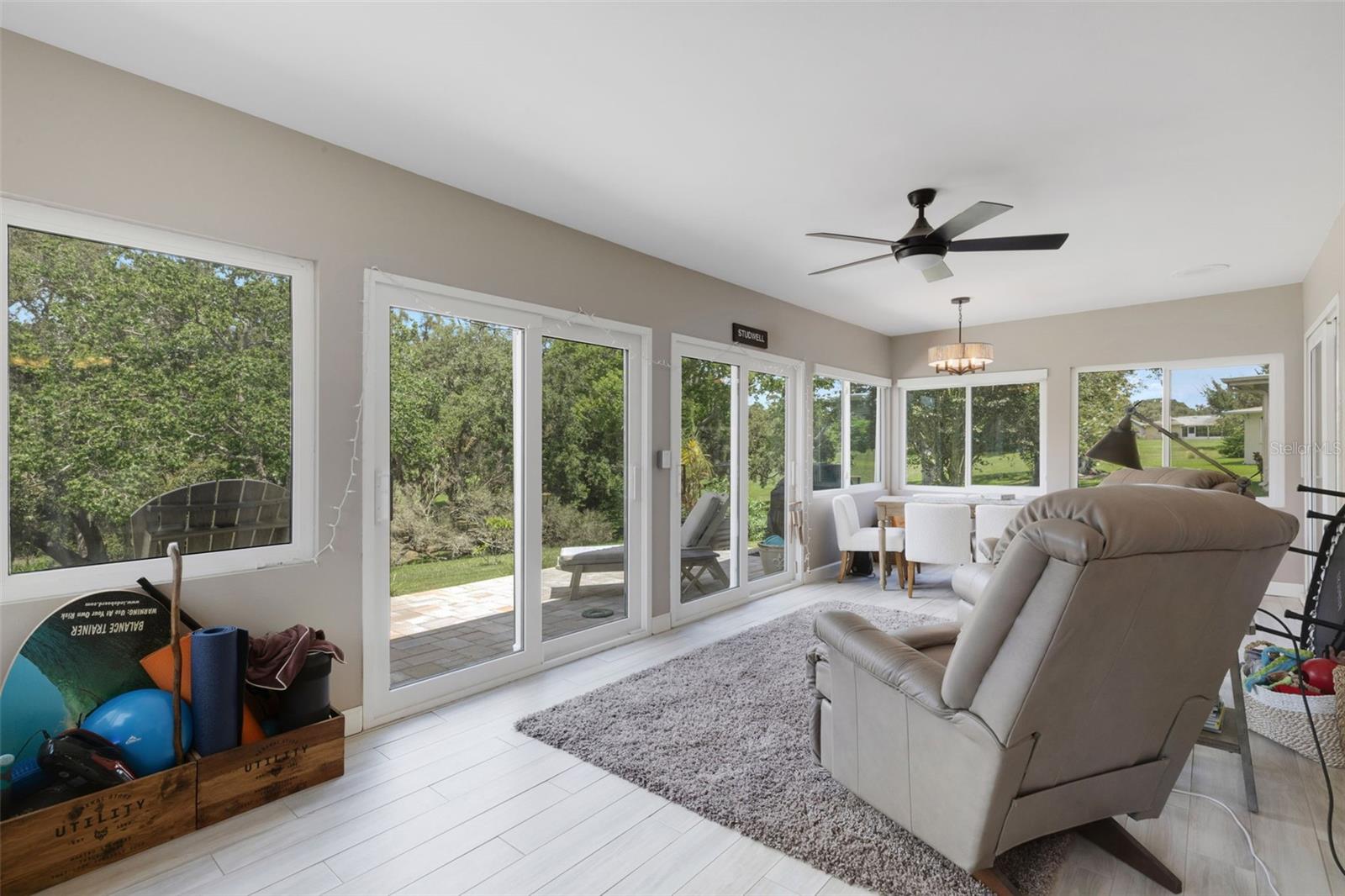 Porcelain Floor tile closely matches the luxury vinyl throughout the house