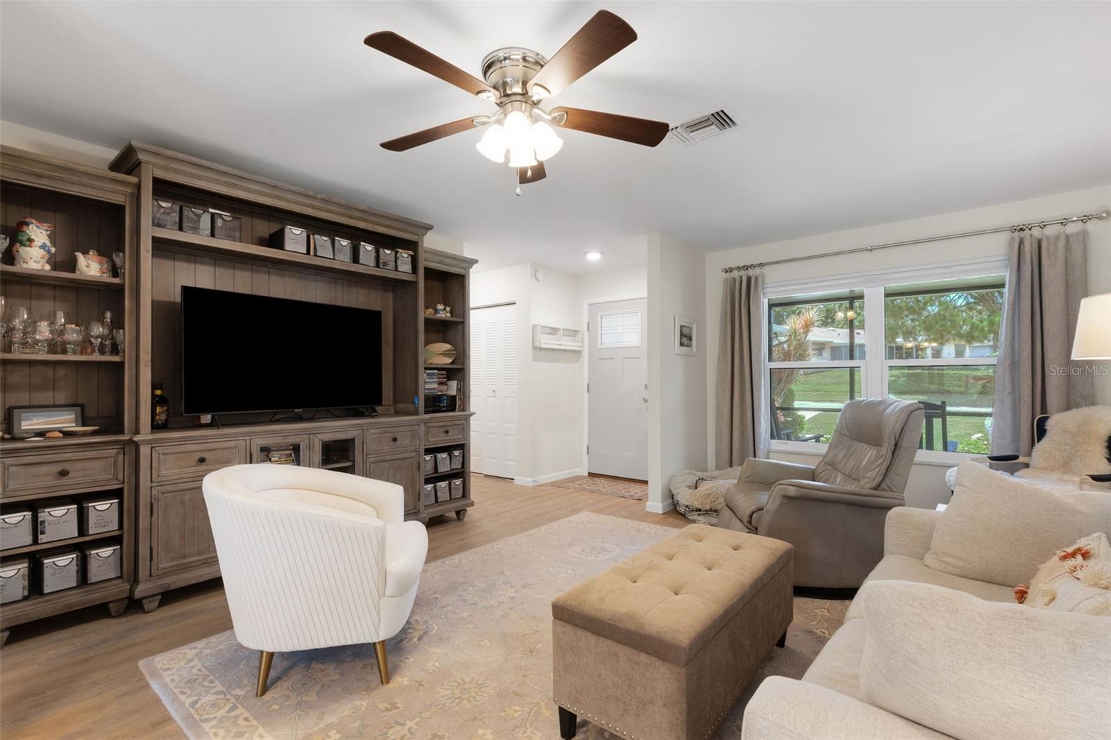 Notice large coat/utility closet and large front window