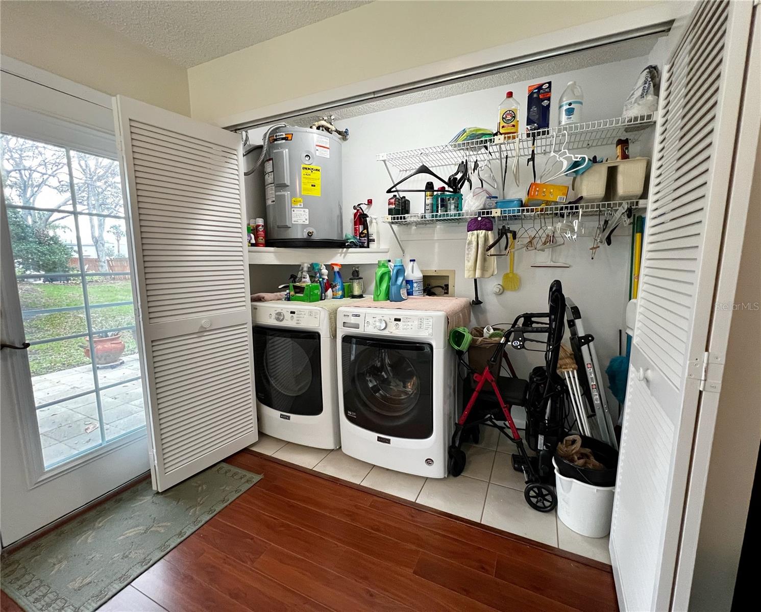Large laundry closet and storage in the closet in the Florida room.
