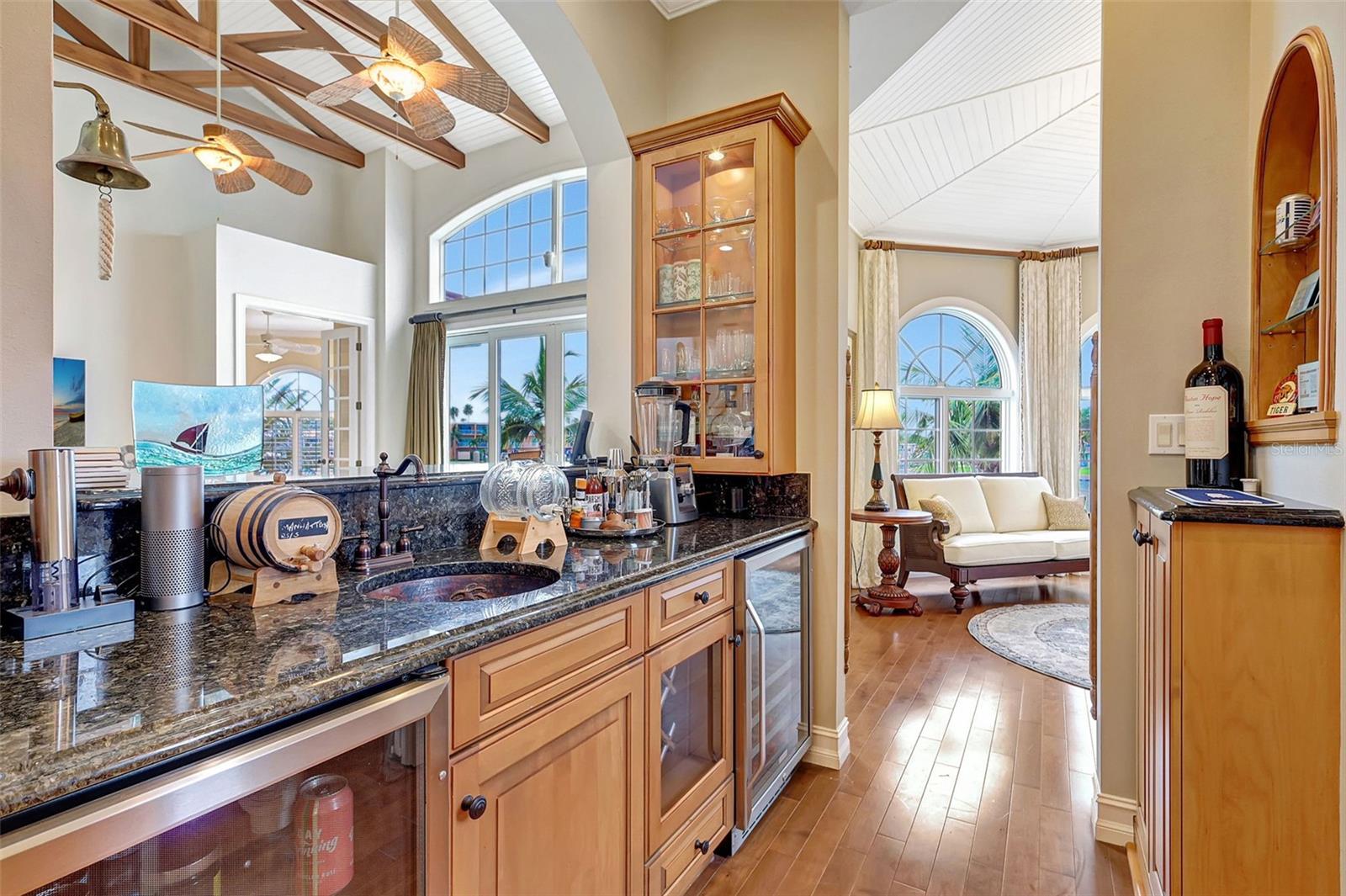 The Entertainment Room Is Conveniently Located Next To The Kitchen, Living Room & Gathering Room.  Enjoy The Water Views!