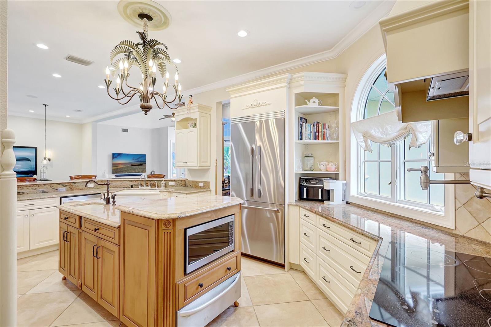 The Center Island Also Features A Built In Microwave & Warming Tray.