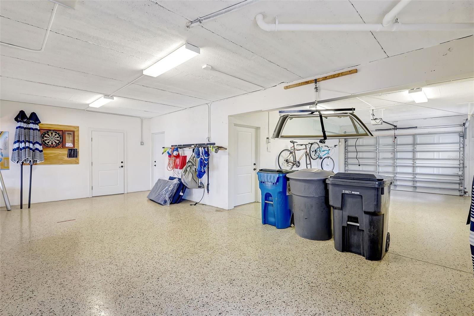 The garages are spacious & the garage doors have hurricane bars.