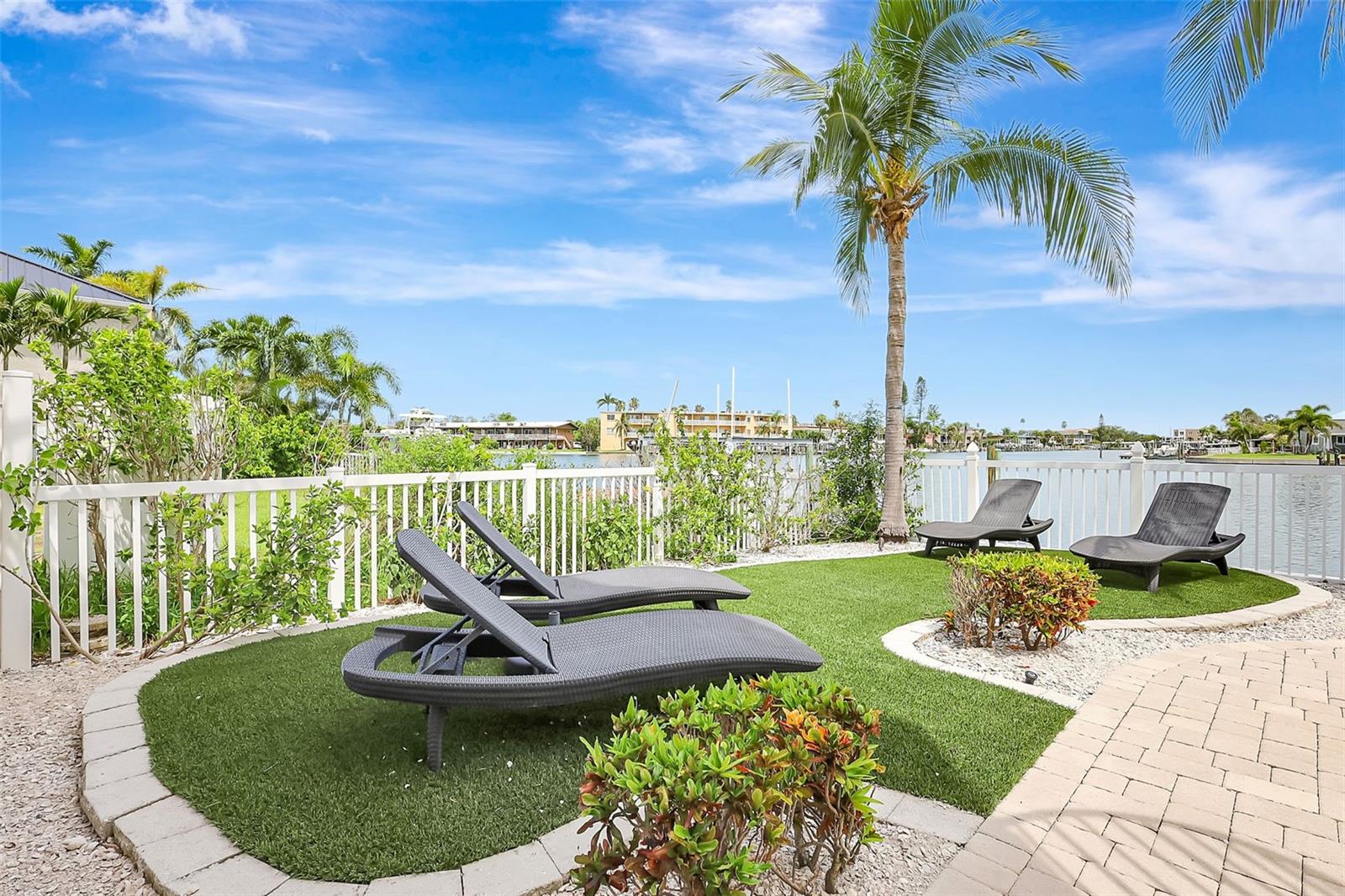 Easy-to-maintain yard, gentle coastal breezes, and lush tropical landscaping make this the perfect Florida home for enjoying the coastal lifestyle.