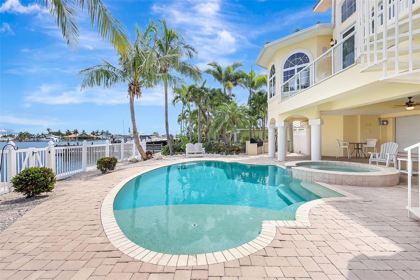 Stunning inground pool with built-in pop-up cleaning system for easy maintenance.