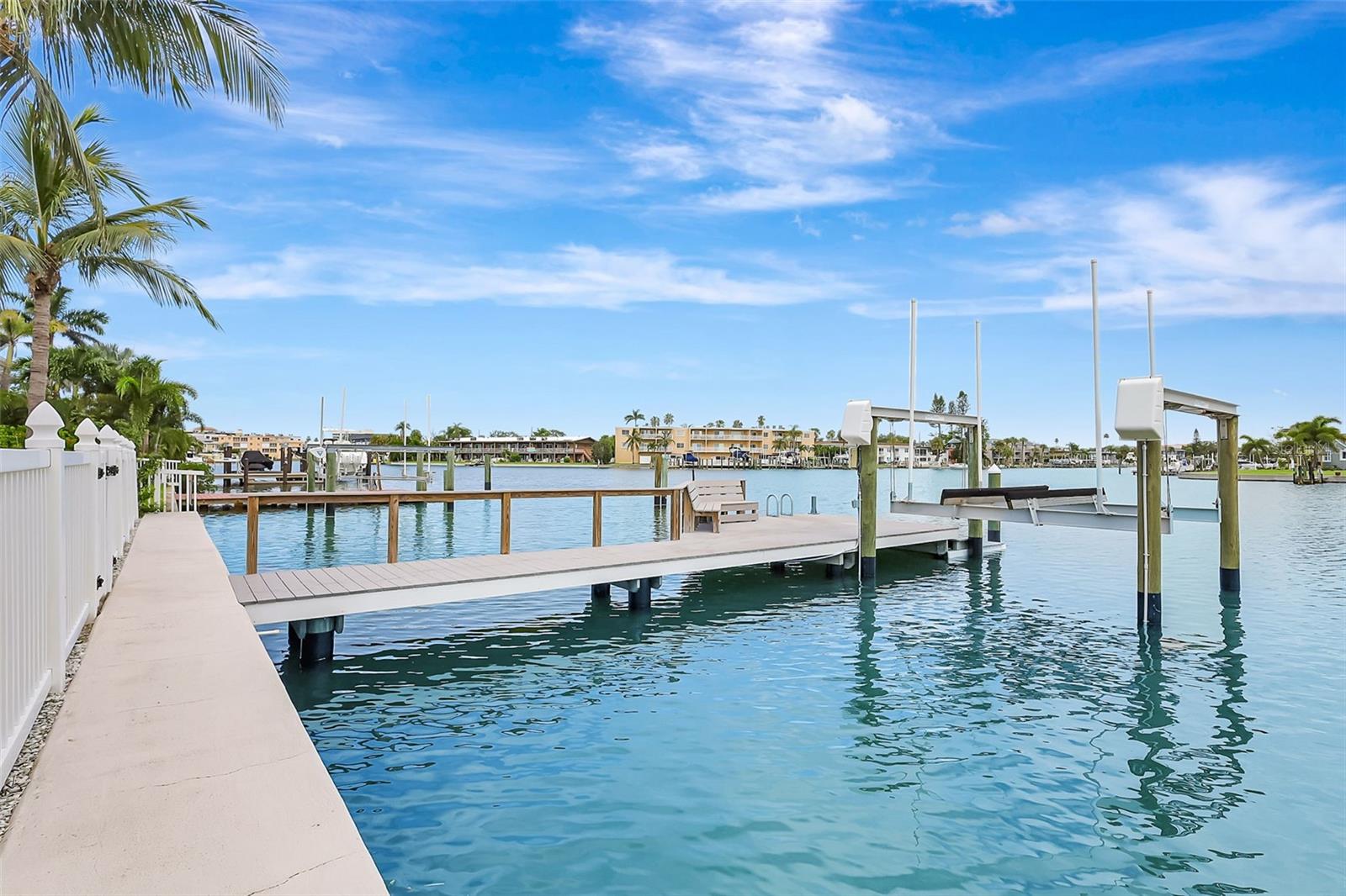 “The property features a durable seawall set on a solid concrete base, offering lasting shoreline protection.  The lift is 10,000 pounds!
