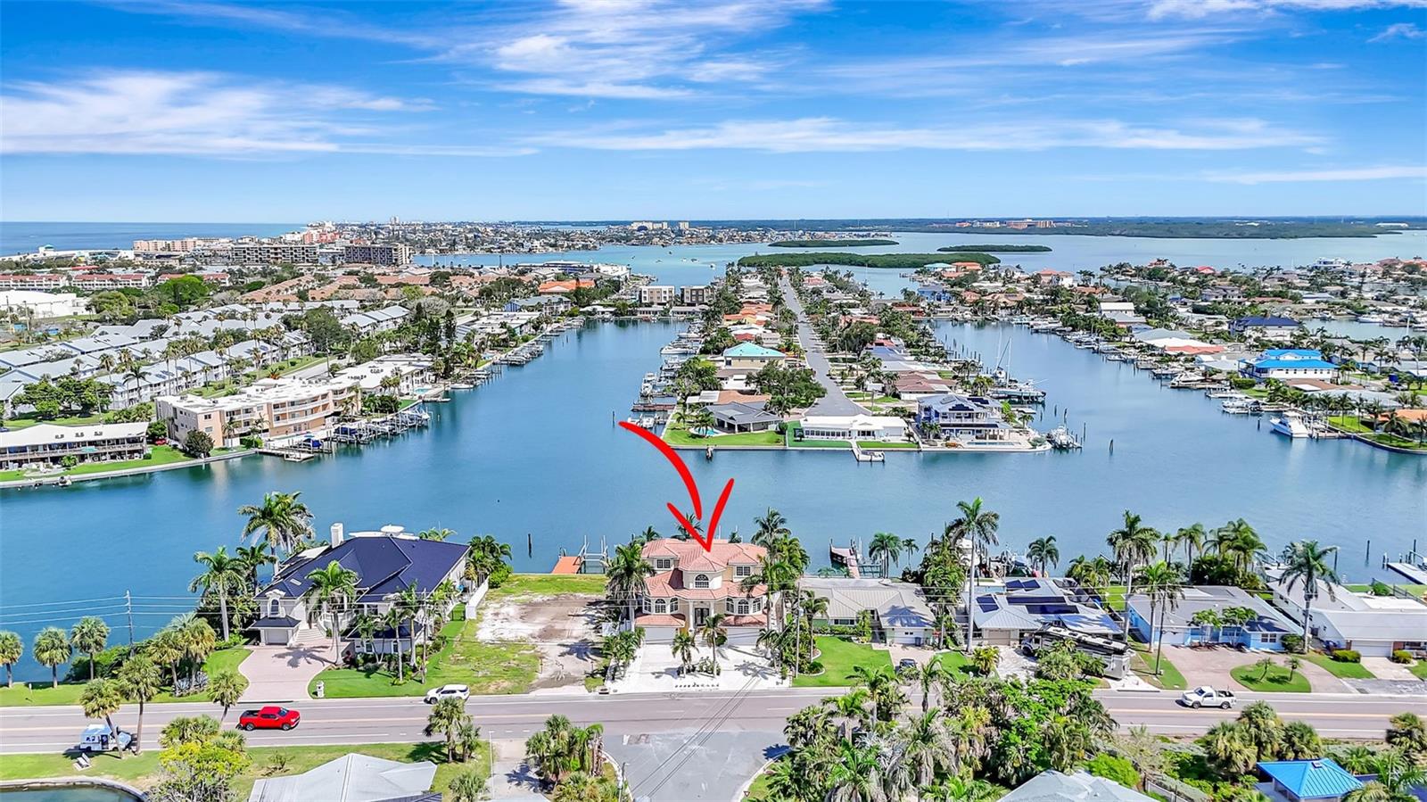This home offers breathtaking views, a prime location, and unmatched convenience for boaters.