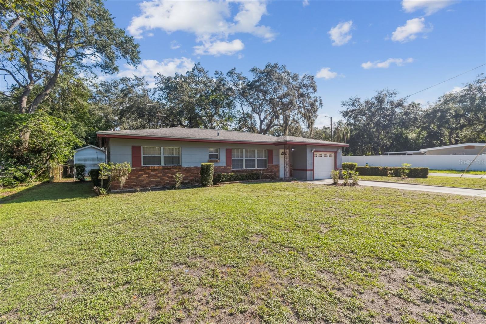 Corner lot home with mature trees