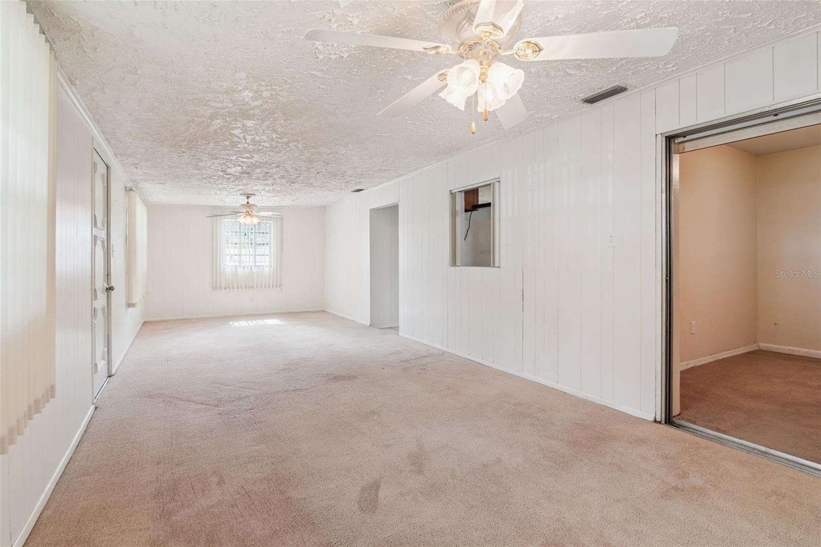 Den and 3rd room to right