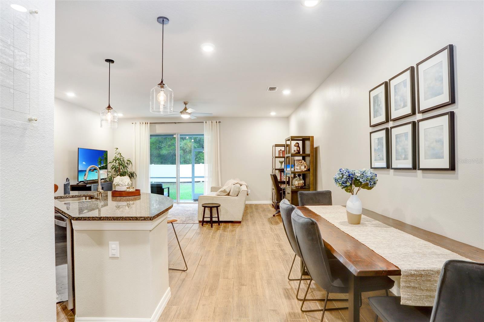 Enjoy the great flow and functionality of the downstairs Kitchen/Dining/Living Space!