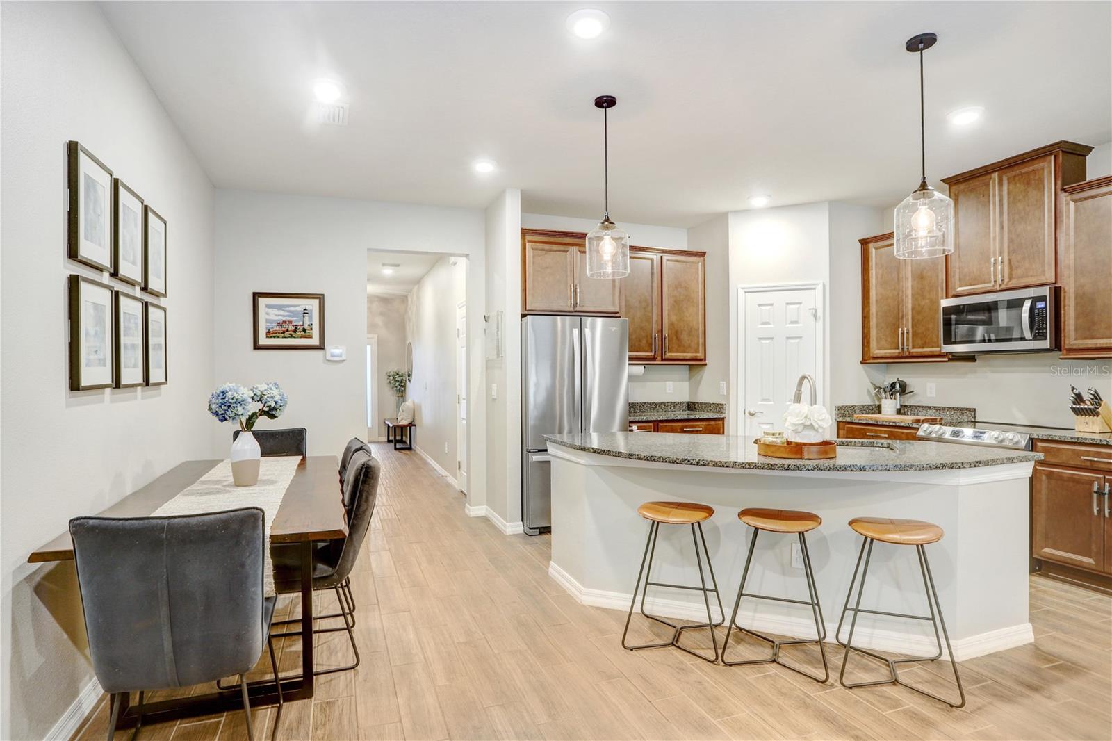 Enjoy the great flow and functionality of the downstairs Kitchen/Dining/Living Space!