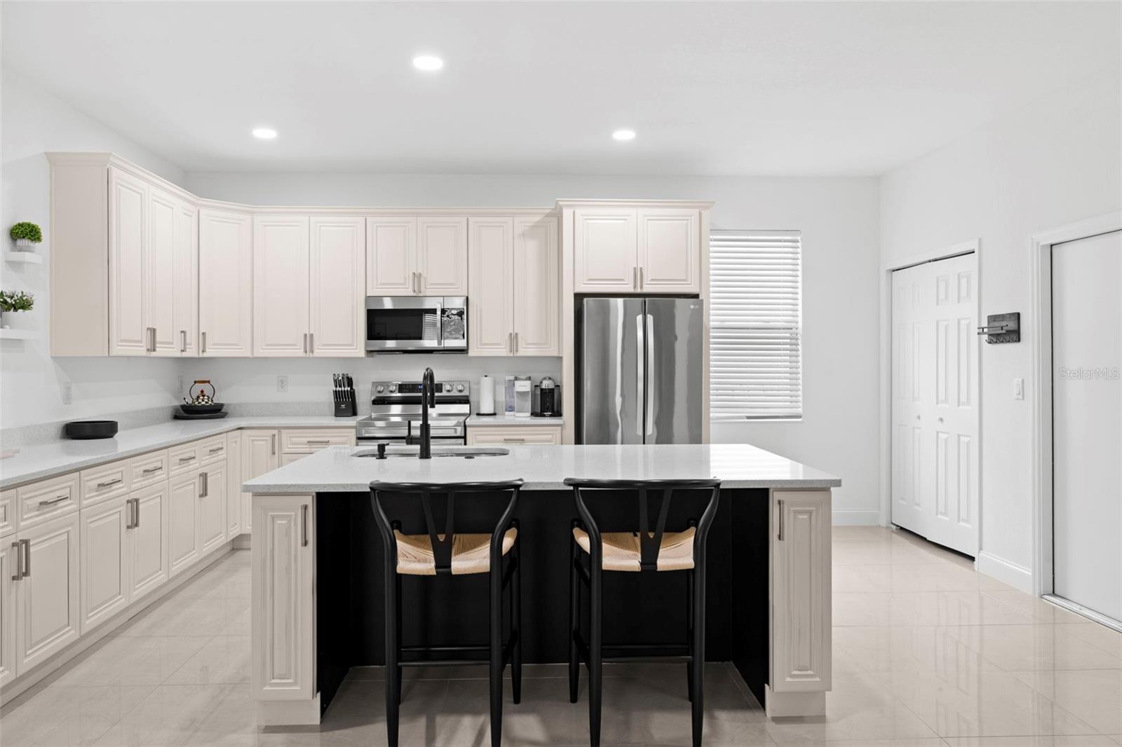 Kitchen w/ Island View of Laundry Closet