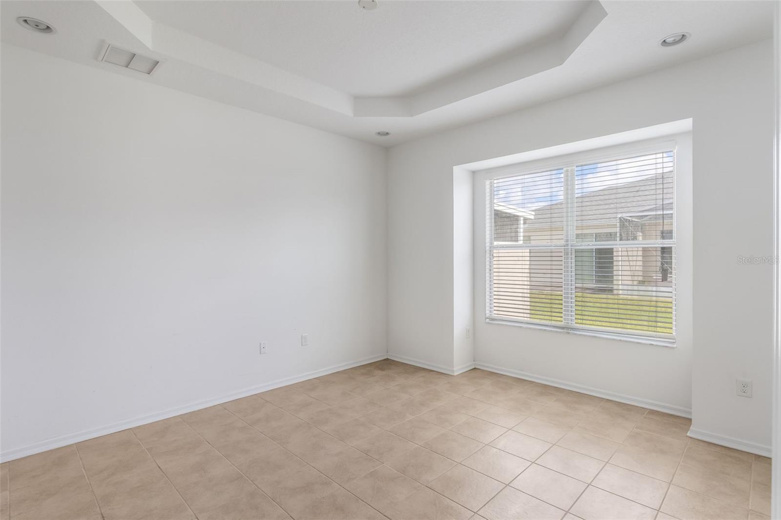 Primary Bedroom w/ Tray Ceilings