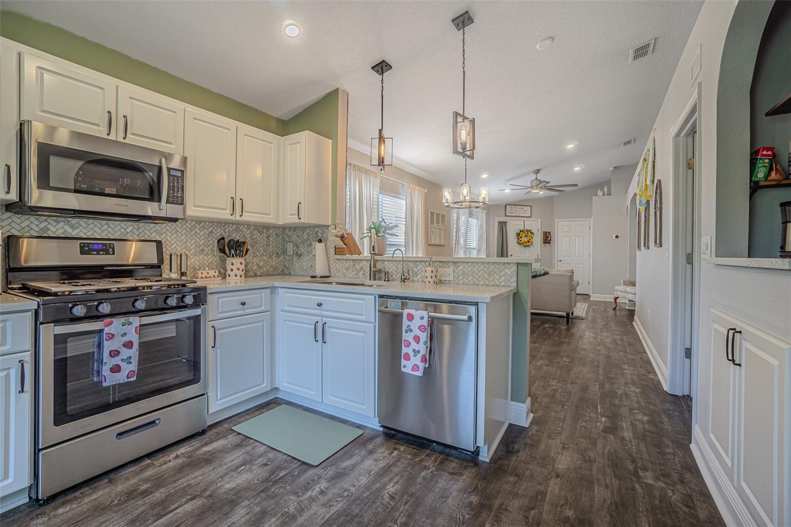 Quartz tops, Marble Herringbone pattern backsplash