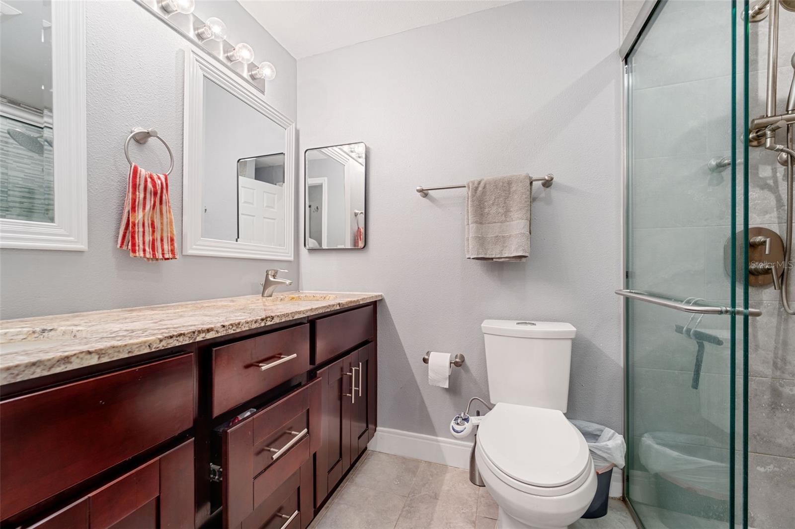 Completely remodeled primary bath with walk in shower and all new plumbing lines