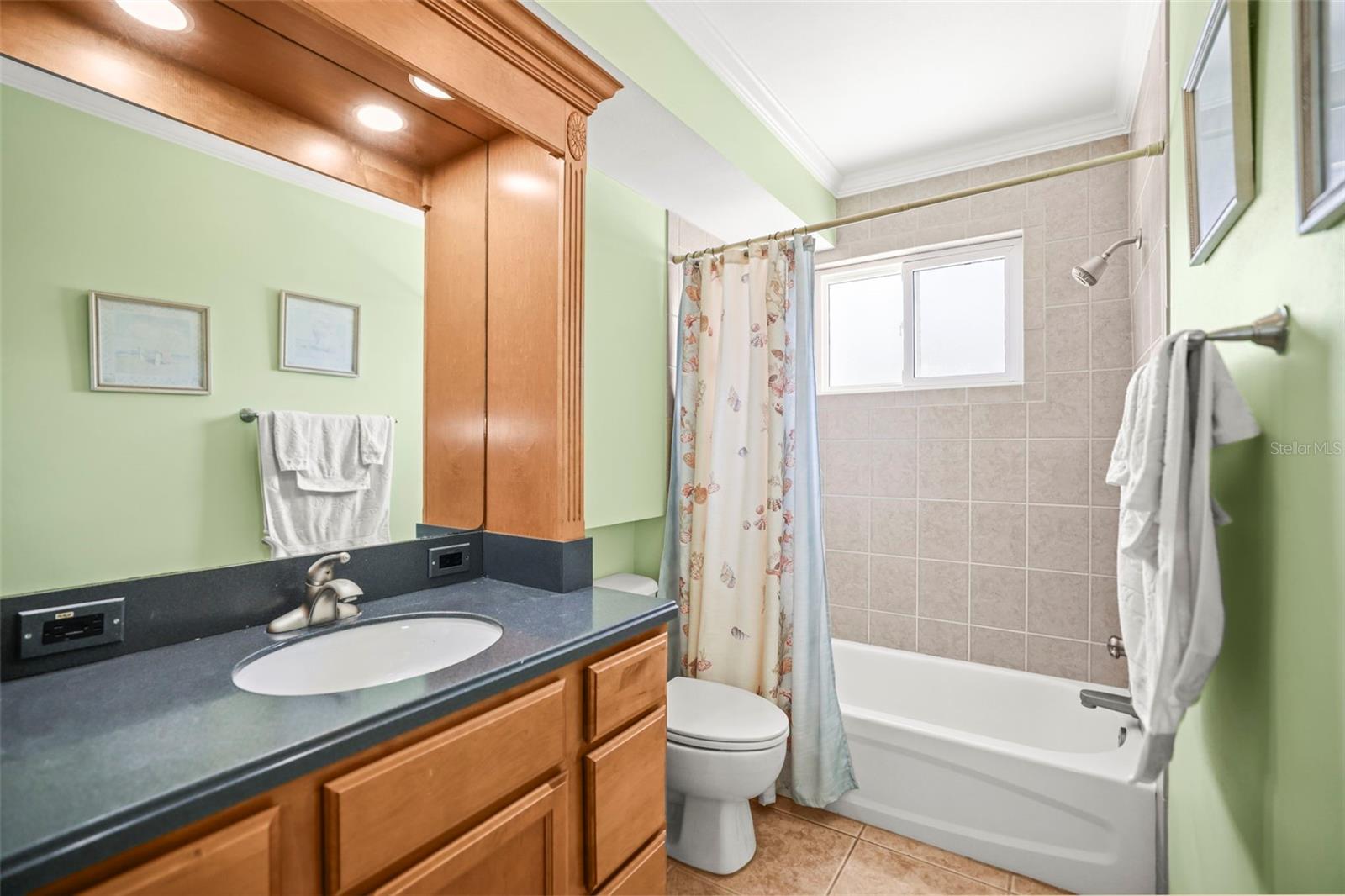 Guest Bath features Shower with Tub