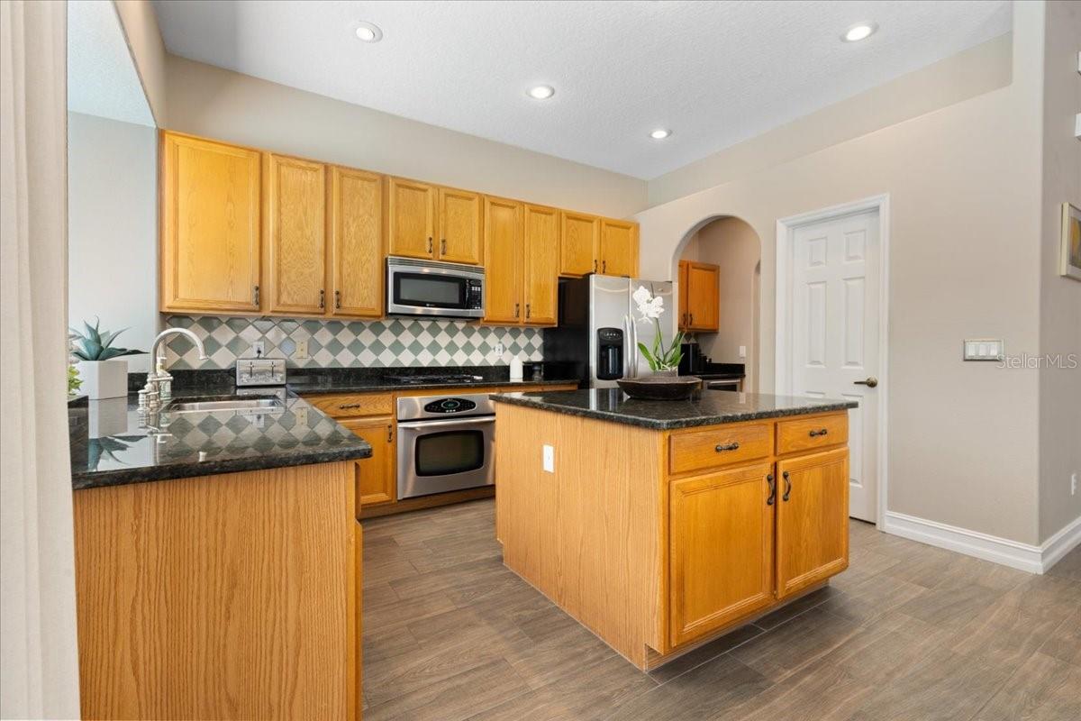 Kitchen with Stainless Steel Appliances and Gas Range