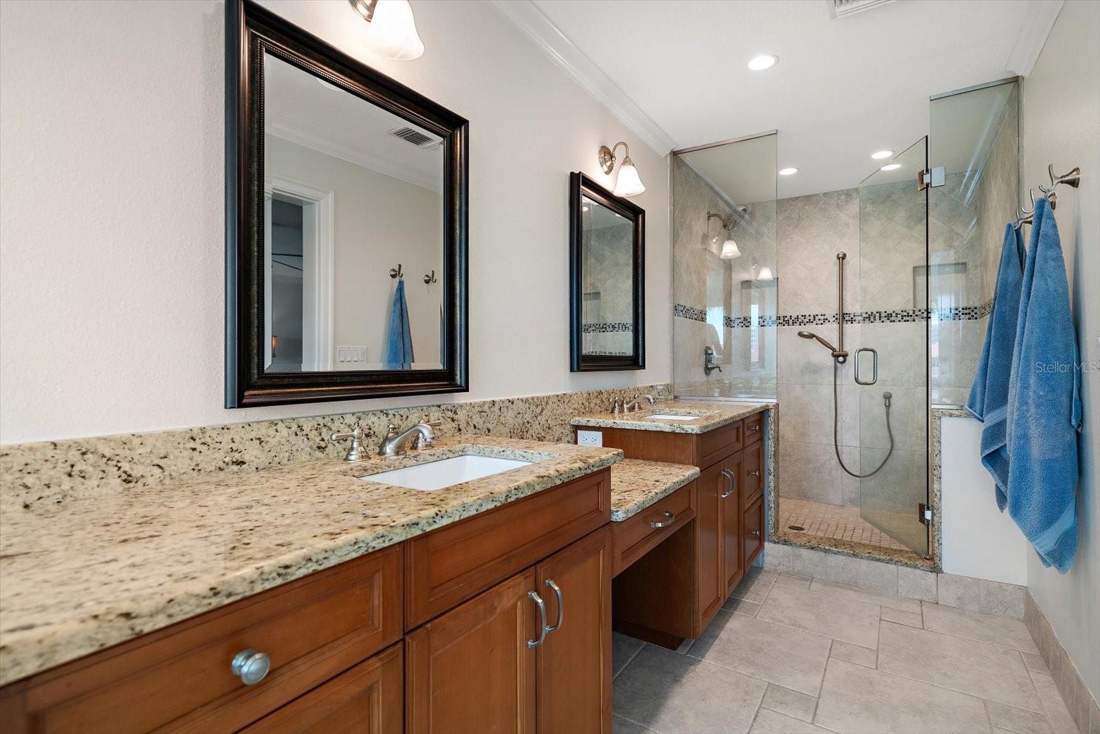 Walk in shower in primary bath area.