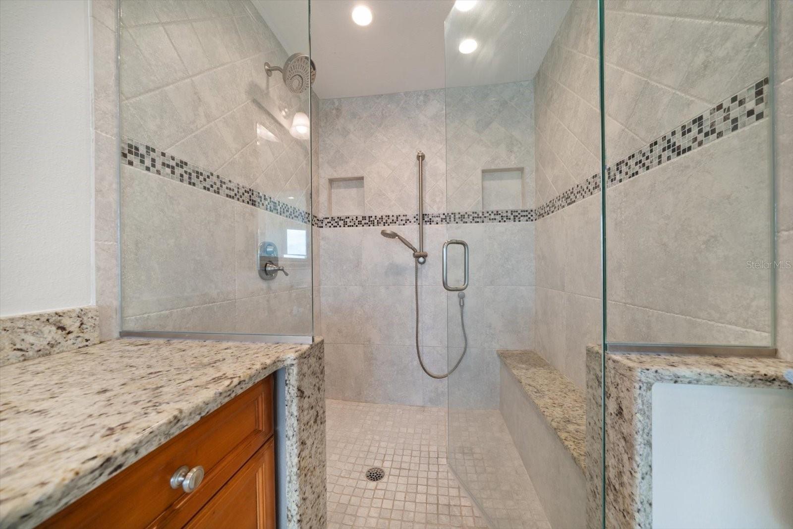 Stunning shower area in primary suite.