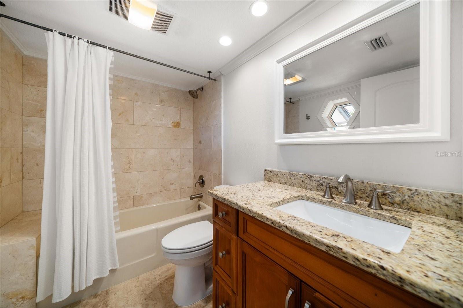 Ensuite bathroom in third bedroom.
