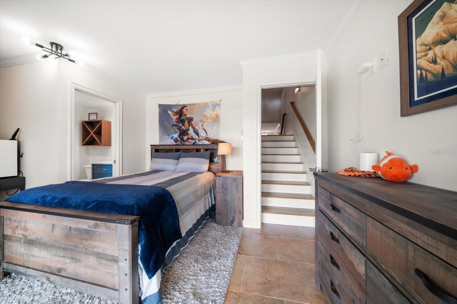 Easy interior access from main level to bonus room with ensuite bath on ground level