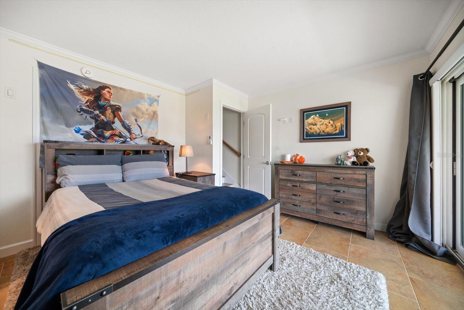 This private bonus area offers access to the ground level terrace.