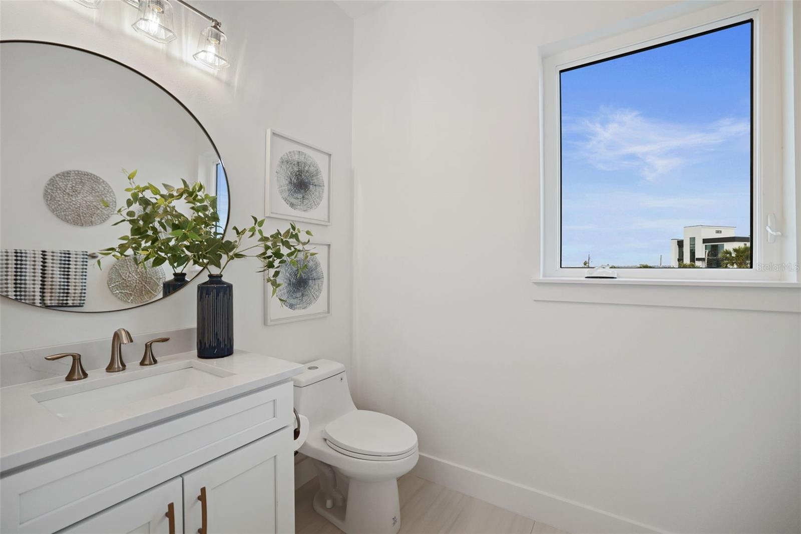 Half Bathroom on 2nd Floor next to Laundry Room