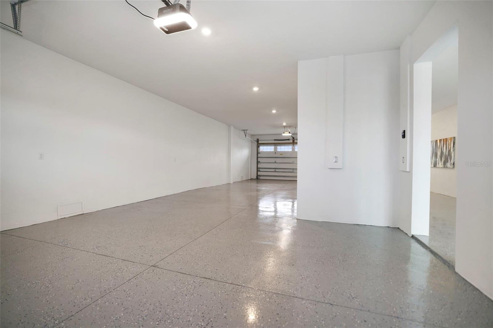 5+ car Garage with Epoxy Flooring and Hurricane rated Garage Doors
