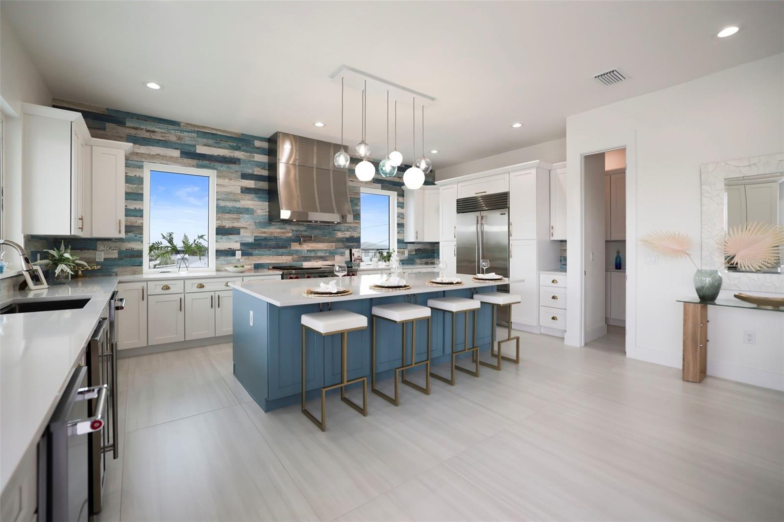 Chefs Kitchen with Stainless Steel Appliances, Large Island and Pantry