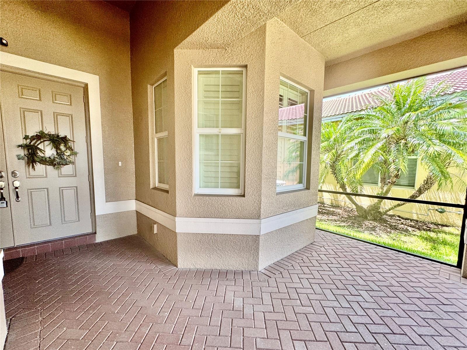 LARGE SCREENED ENTRYWAY UPGRADE WELCOMES YOU